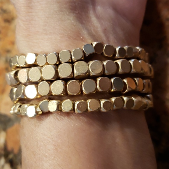 Set of 4 stretchy goldtone bracelets - Picture 1 of 1